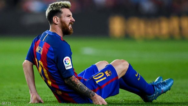 BARCELONA SPAIN- SEPTEMBER 21 Lionel Messi of FC Barcelona reacts injured on the pitch during the La Liga match between FC Barcelona and Club Atletico de Madrid at the Camp Nou stadium