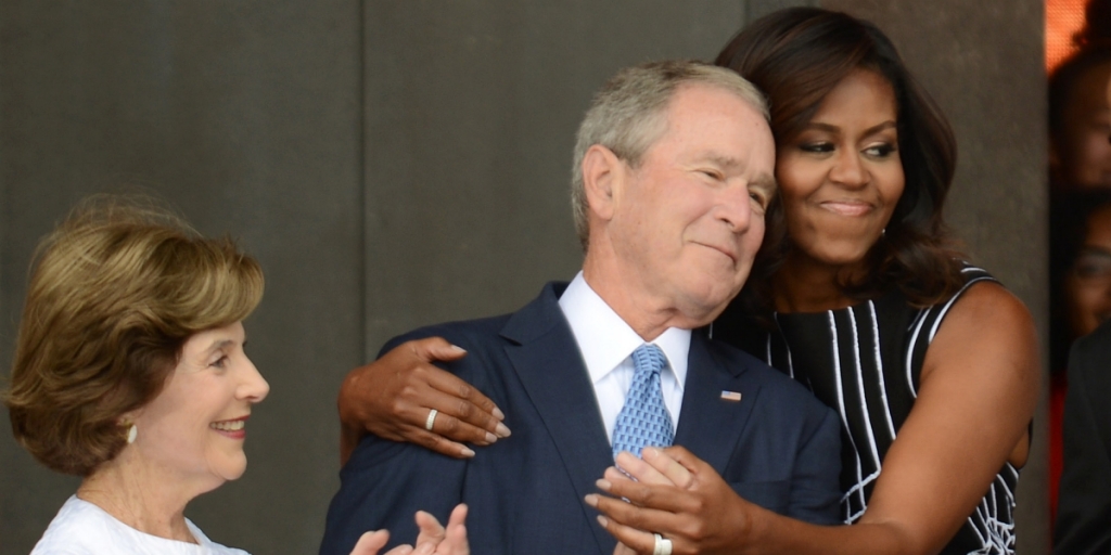 Hugging George W. Bush Has Inspired Many He got a major image boost from the First Lady at the NMAAHC opening