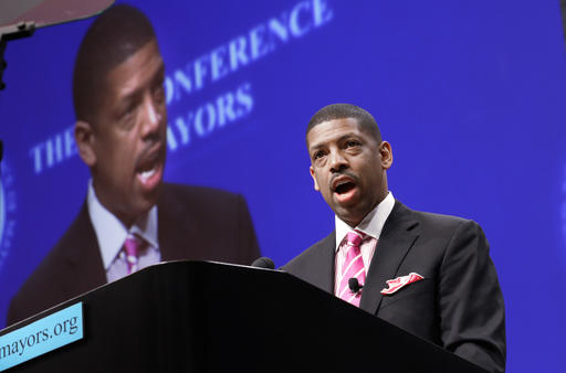 Sacramento Calif. Mayor Kevin Johnson president of the U.S. Conference of Mayors speaks before a panel discussion about sports and race relations during a conference meeting in Dallas. A man hit Mayor Johnson