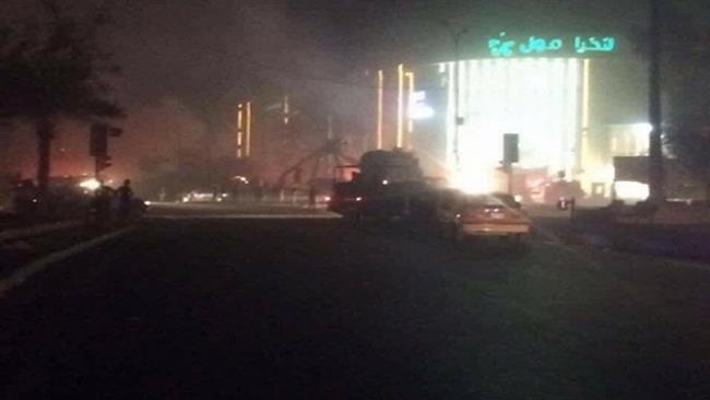 Forat news agency shows the aftermath of two car bomb attacks outside al Nakhil Mall in Palestine Street in eastern Baghdad Iraq