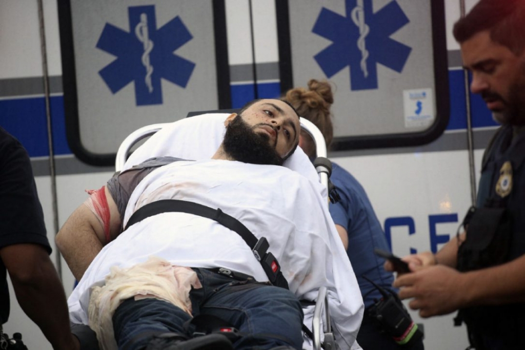 Ahmad Khan Rahami is taken into custody after a shootout with police on Monday in Linden N.J. Rahami was wanted for questioning in the bombings that rocked the Chelsea neighbourhood of New York and the New Jersey shore town of Seaside Park over the weeke