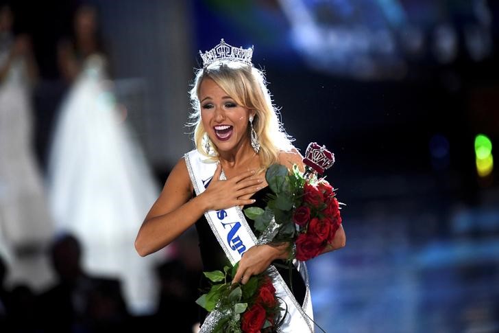 Savvy Shields a college student from Arkansas won the annual Miss America pageant on Sunday after impressing judges with a jazz dance routine and her answer to a question about her take on presidential candidate Hillary Clinton