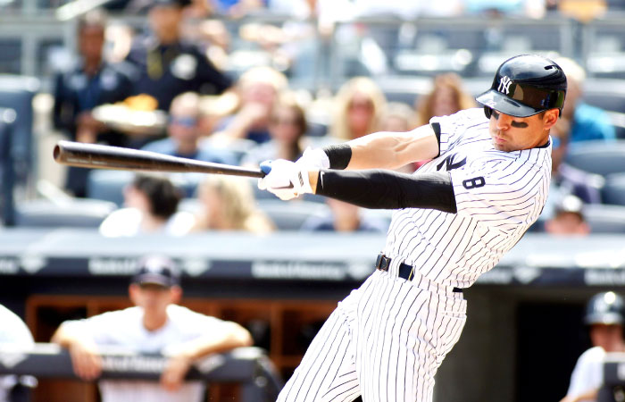 New York Yankees’ center fielder Jacoby Ellsbury hits a home run against the Toronto Blue Jay at Yankee Stadium Monday. — Reuters