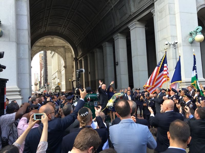 Bill Bratton's final day as police commissioner. He left One Police Plaza to bagpipes and cheers and climbed in a 1930s emergency service vehicle for a final farewell ride