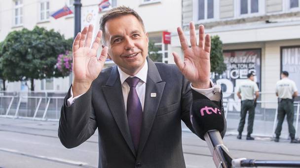 Peter Kazimir answers questions upon his arrival for the informal meeting of ministers for economic and financial affairs in Bratislava Slovakia