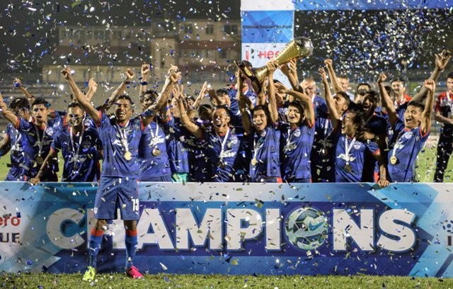 Bengaluru FC players celebrate after winning the I League title this