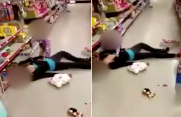 Police
A little girl tries to wake her mother who passed out in a Massachusetts store on Sunday