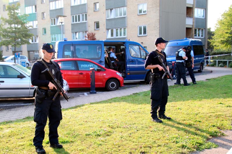 Police guard the area where a shooting took place in Copenhagen's Christiania district