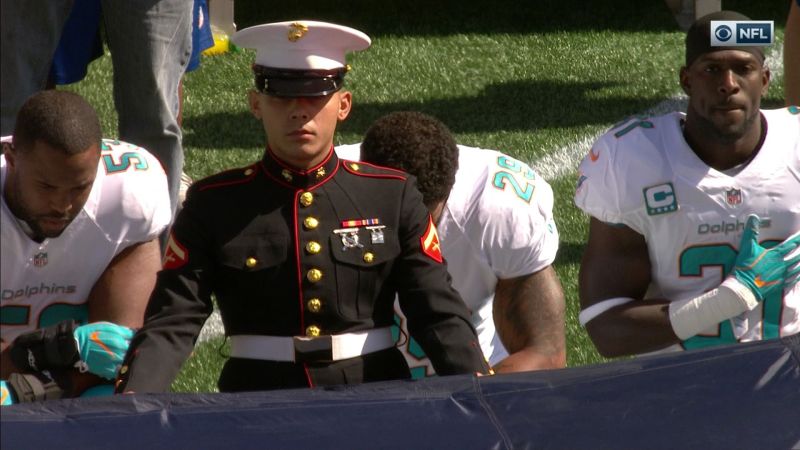 Dolphins fans burn Miami jerseys to protest kneeling players