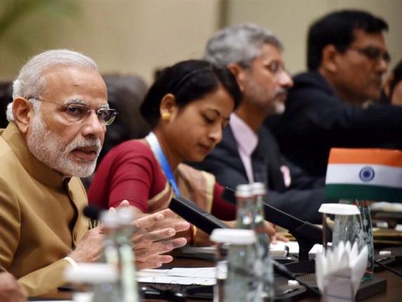 Prime Minister Narendra Modi during a meeting with U.K. Prime Minister Theresa May at the G20 summit in Hangzhou China on Monday