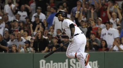 Red Sox first baseman Hanley Ramirez watches his three run home run during the fifth inning against the Yankees