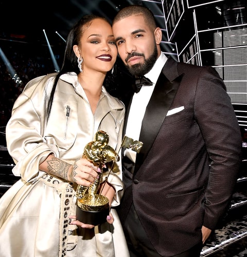 Rihanna and Drake pose onstage during the 2016 MTV Video Music Awards