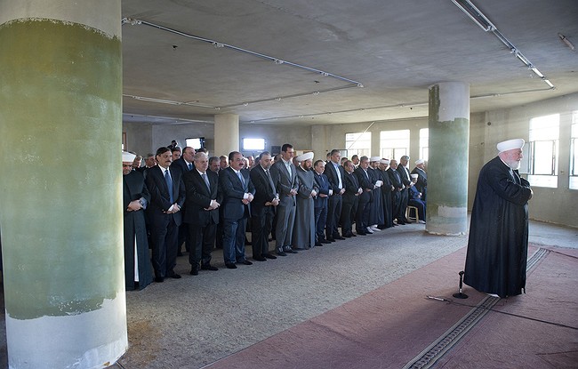 Bashar al-Assad: Syrian leader prays at Daraya mosque for Eid – state media