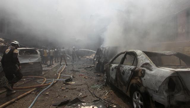 Smoke rises after an airstrike on al Jalaa street in the rebel held city of Idlib Syria