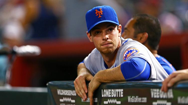 Steven Matz looks on to the action in Arizona