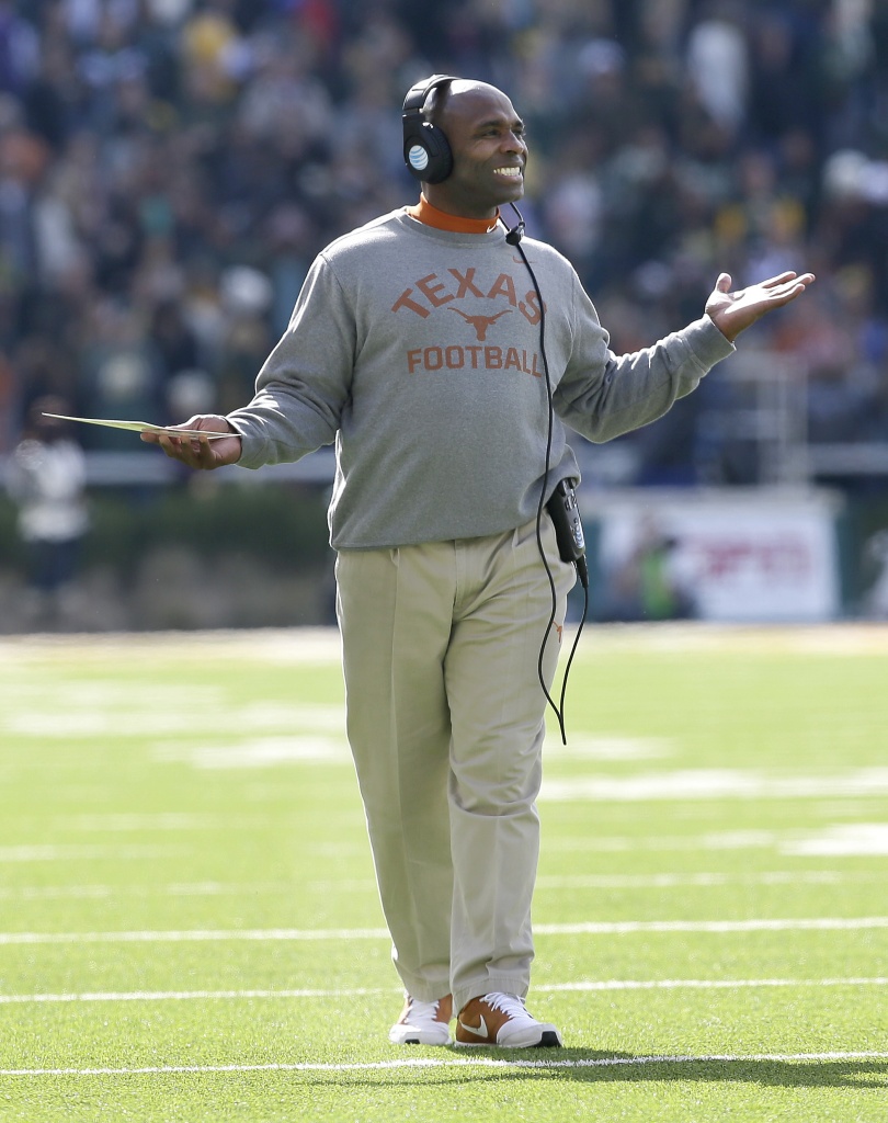 Texas head coach Charlie Strong reacts to play during the first half of an NCAA college football game against Baylor Saturday Dec. 5 2015 in Waco Texas