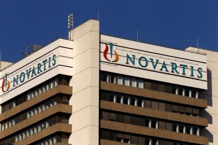 The logo of Swiss pharmaceutical company Novartis is seen on its headquarters building in Basel Switzerland