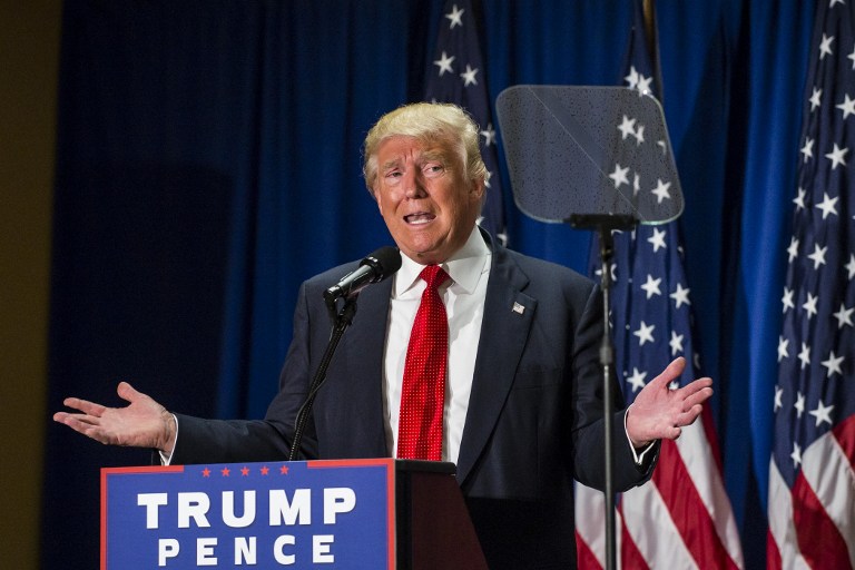 Republican presidential nominee Donald Trump addresses supporters at Cleveland Arts and Sciences Academy