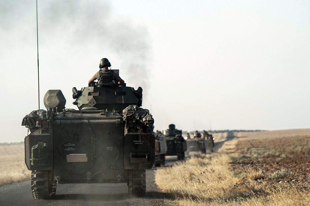 Turkish troops head to the Syrian border in Karkamis Turkey Saturday Aug. 27 2016. Turkey on Wednesday sent tanks across the border to help Syrian rebels retake the key Islamic State-held town of Jarablus and to contain the expansion of Syria's