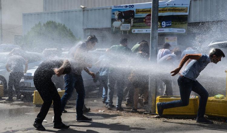 Turkish police uses water cannon against teachers in Diyarbakir on Friday during a protest