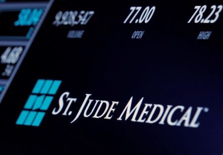 The ticker and trading information for St. Jude Medical is displayed where the stock is traded on the floor of the NYSE