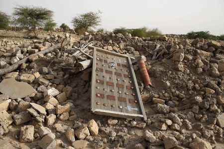 The rubble left from an ancient mausoleum destroyed by Islamist militants is seen in Timbuktu