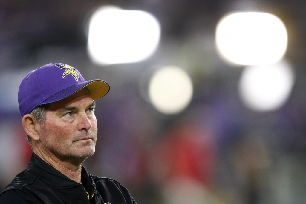 Minnesota Vikings head coach Mike Zimmer stands on the field before an NFL football game against the Green Bay Packers Sunday Sept. 18 2016 in Minneapolis