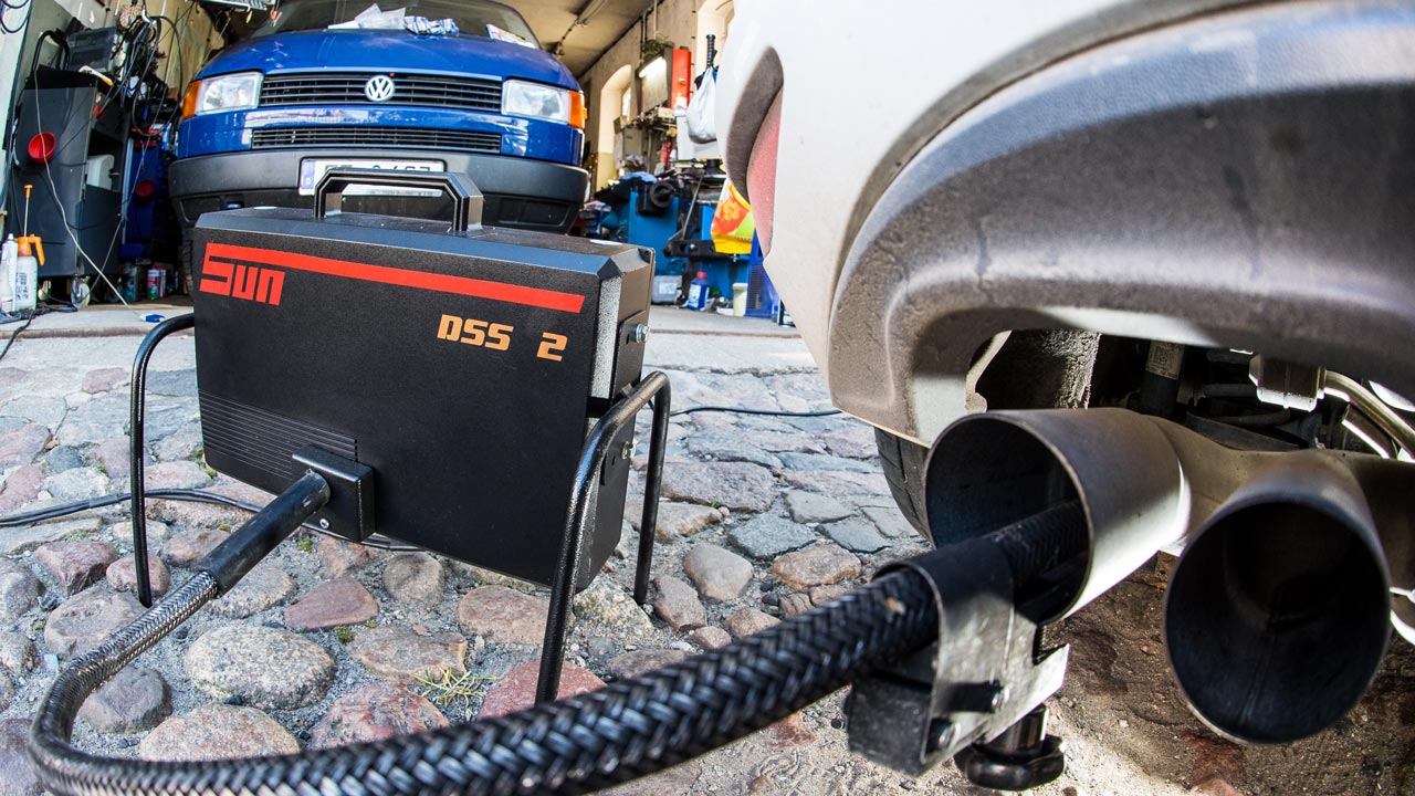 1 2015 in a car workshop in Frankfurt an der Oder eastern Germany shows a measuring tube sticking in the exhaust pipe of a Volkswagen Golf 2,0 TDI car during an emissions test. German car giant Volkswagen is the