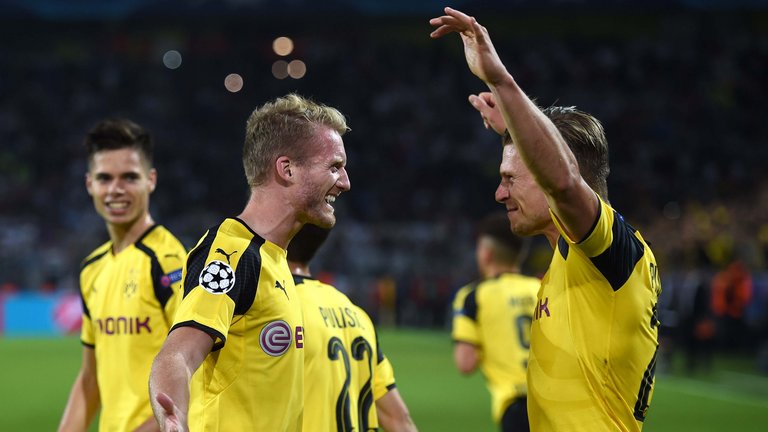 Andre Schurrle celebrates after scoring Dortmund's late equaliser