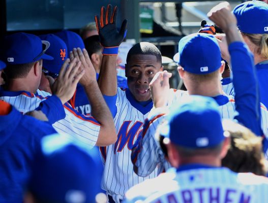 New York Mets centerfielder Curtis Granderson is greeted