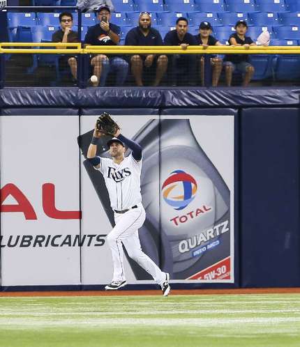 Tampa Bay Rays center fielder Kevin Kiermaier gets under the fly ball by New York Yankees left fielder Brett Gardner in the first inning of the game between the New York Yankees and the Tampa Bay Rays in Tropicana Field on Tuesday Sept. 20 201