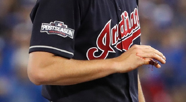 TORONTO ON- OCTOBER 17 Cleveland Starting pitcher Trevor Bauer drips blood off his injured finger in the first inning. He had to leave the game.
The Toronto Blue Jays lost to the Cleveland Indians 4-2 at the Rogers Centre in Toronto. This was the