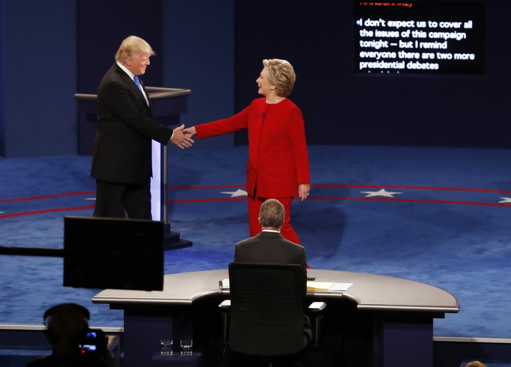 Democratic presidential nominee Hillary Clinton right shakes hands with Republican presidential nominee Donald Trump at the start of the presidential debate at Hofstra University in Hempstead N.Y. Monday Sept. 26 2016