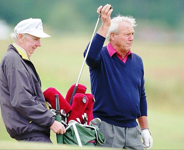 Arnold Palmer at the Open Championship with faithful caddie Tip Anderson in 1995