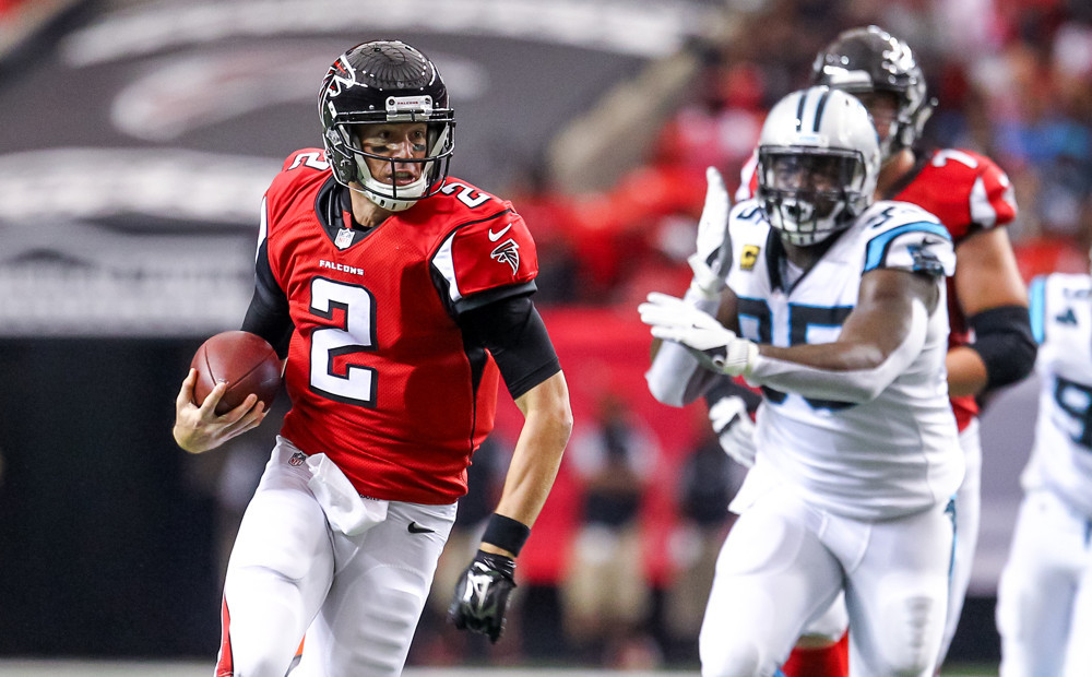 Oct. 2 2016 Atlanta Falcons quarterback Matt Ryan runs for a first down during the first half of the NFL game between the Carolina Panthers and the Atlanta Falcons. The Falcons beat the Panthers 48- 33 at the Georgia Dome in Atlanta Georgia. (Phot