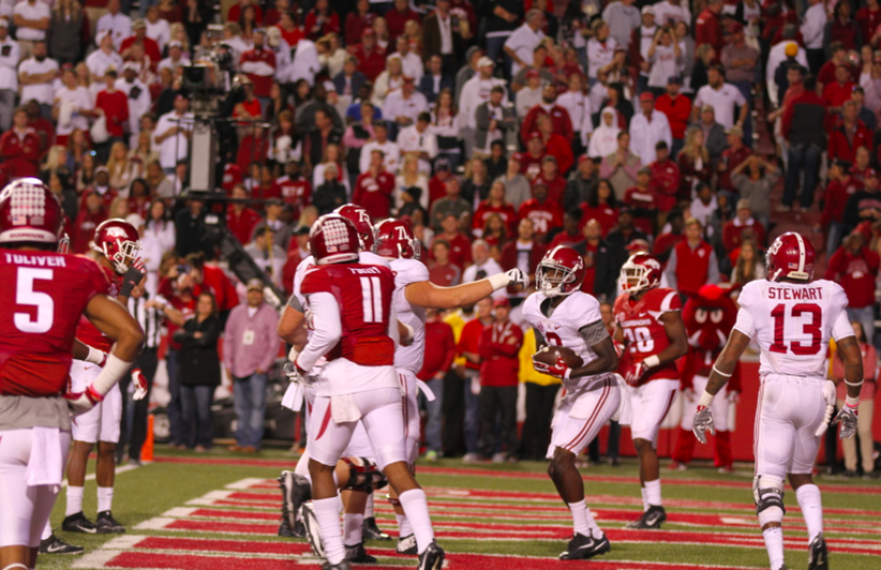 Hurts, Alabama defense, lead way to 49-30 win over Arkansas