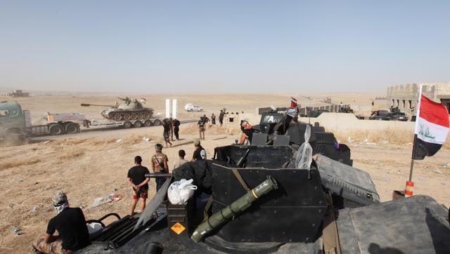 Iraqi security forces and Peshmerga forces gather on the east of Mosul during preparations to attack Mosul Iraq on Saturday