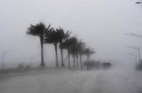 JEWEL SAMAD  AFP  Getty Images		Commuters made their way through heavy rain in Jacksonville Florida