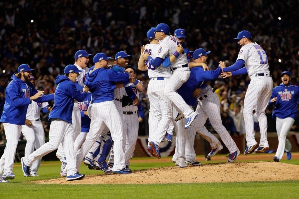 The Chicago Cubs celebrate after defeating the Los Angeles Dodgers 5-0 in Game 6 of the National League Championship Series to advance to the World Series against the Cleveland Indians at Wrigley Field