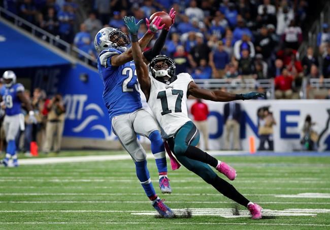 Detroit Lions cornerback Darius Slay intercepts a pass intended for Philadelphia Eagles wide receiver Nelson Agholor in the fourth quarter of an NFL football game Sunday Oct. 9 2016 in Detroit. Detroit defeated Philadelphia 24-23. (AP