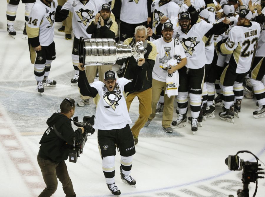 Penguins captain Sidney Crosby lifts the Cup after winning 3-1 against the San Jose Sharks in Game 6 of the 2016 Stanley Cup Finals