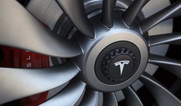 On an adjusted basis Tesla reported a profit of 71 cents per share compared with a loss of $US1.35 per share in the