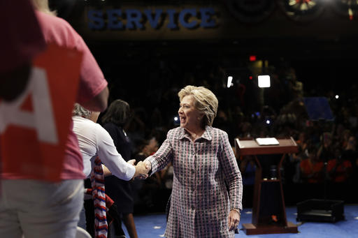 Democratic presidential candidate Hillary Clinton meets with attendees during a campaign stop in Fort Pierce Fla. Friday Sept. 30 2016