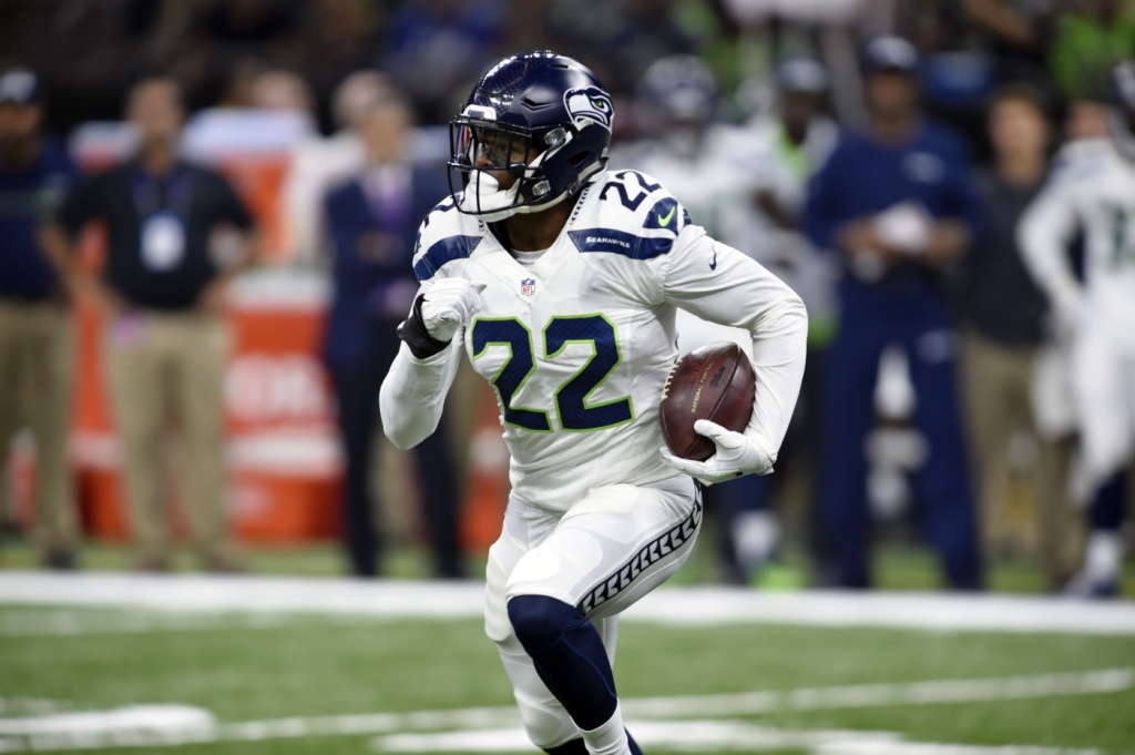 Seattle Seahawks running back C.J. Prosise carries in the first half of an NFL football game against the New Orleans Saints in New Orleans Sunday Oct. 30 2016