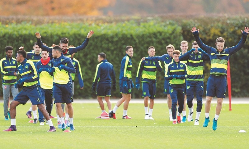 ARSENAL players attend a training session at the London Colney ground on Tuesday ahead of their Champions League match against Paris Saint Germain.—AFP