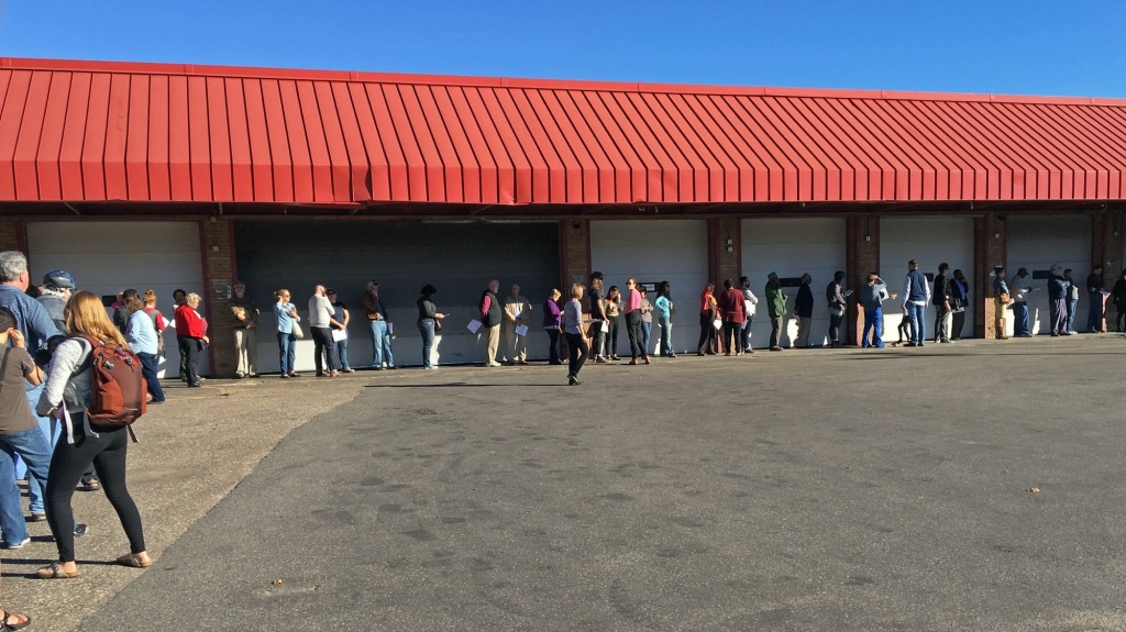 About 70 people waited in line at an early voting center