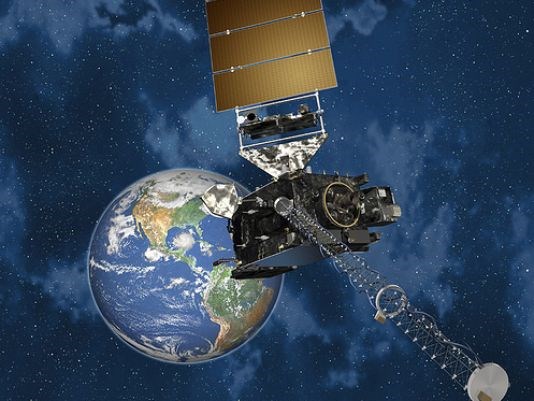 An artist's conception of the GOES-R satellite in orbit around the Earth