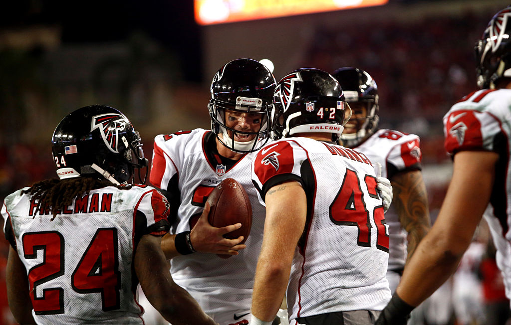 TAMPA FL- NOVEMBER 3 Fullback Patrick Di Marco #42 of the Atlanta Falcons celebrates his touchdown with quarterback Matt Ryan #2 and running back Devonta Freeman #24 during the third quarter of an NFL game against the Tampa Bay Buccaneers on November 3