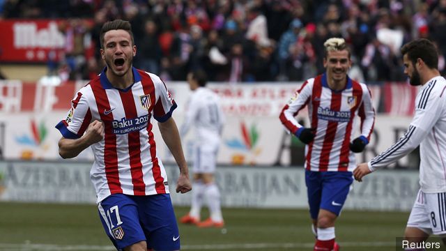 Atletico Madrid's Saul Niguez celebrates after scoring a goal against Real Madrid