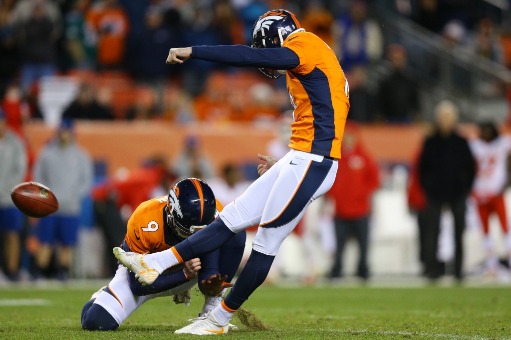 DENVER CO- NOVEMBER 27 Kicker Brandon Mc Manus #8 of the Denver Broncos makes a field goal in overtime of the game against the Kansas City Chiefs at Sports Authority Field at Mile High